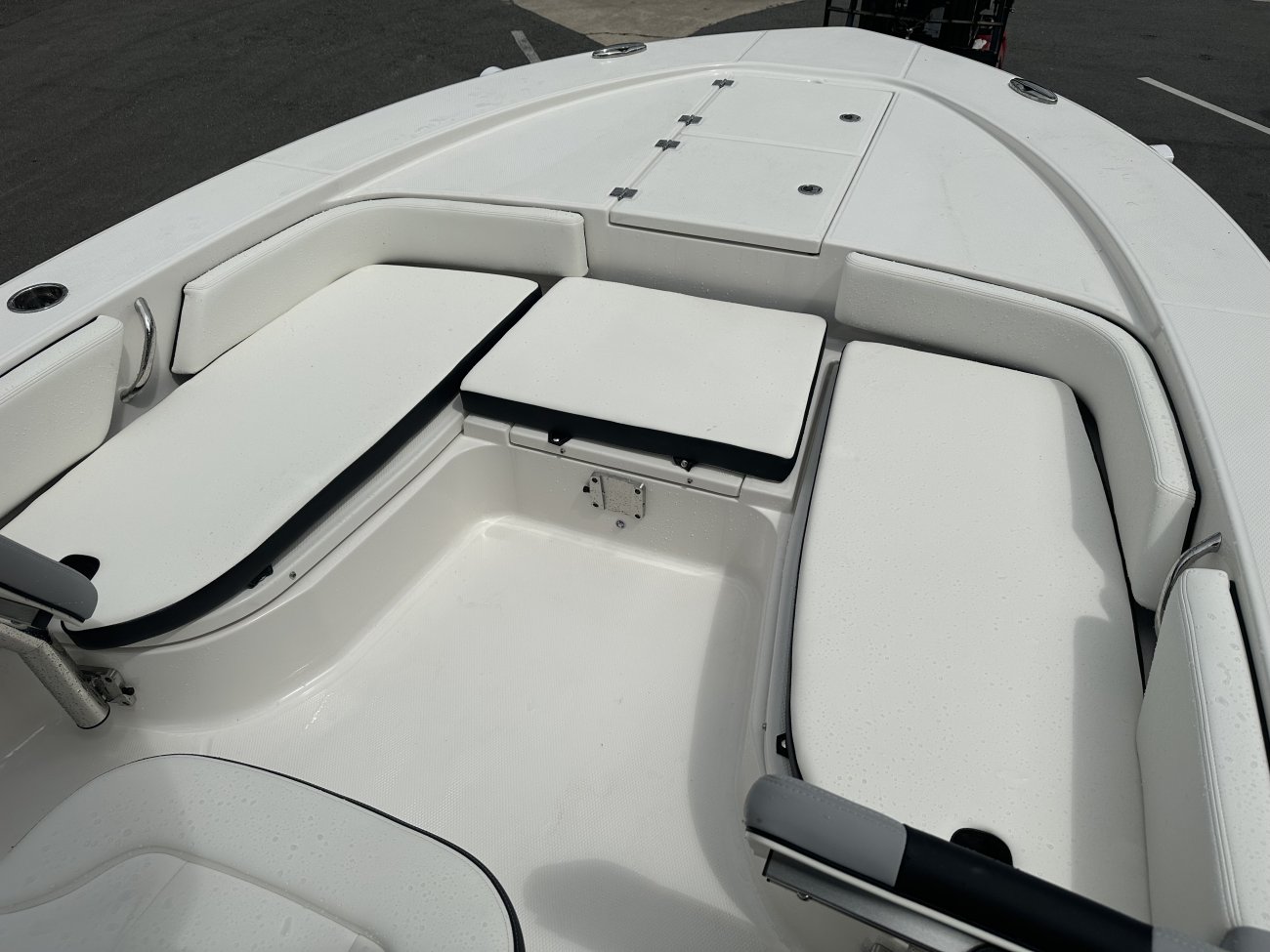 The definition of an outboard motor is a detachable engine mounted on outboard brackets on the stern of your boat.  This configuration will have only one single engine.