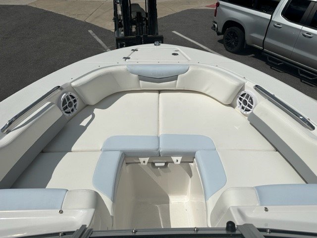Glass fibers either loose or woven, reinforced with resin and used in the construction of many boats.
