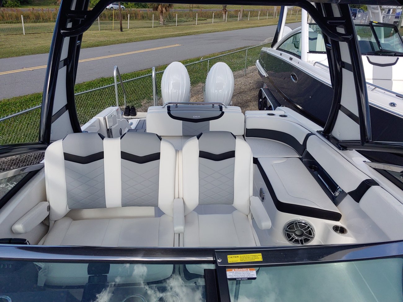 A bow rider is a boat with an open bow area where there are extra seats in front of the windshield.  Bow riders are typically between 17' and 30'long. They are well suited for many recreational water sports such as tubing, water skiing, and swimming.