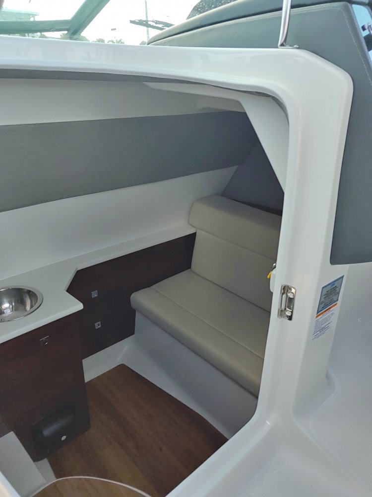 A bow rider is a boat with an open bow area where there are extra seats in front of the windshield.  Bow riders are typically between 17' and 30'long. They are well suited for many recreational water sports such as tubing, water skiing, and swimming.