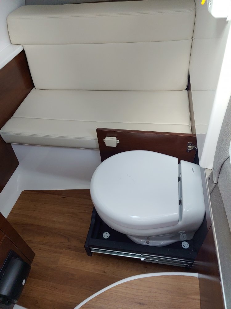 Glass fibers either loose or woven, reinforced with resin and used in the construction of many boats.