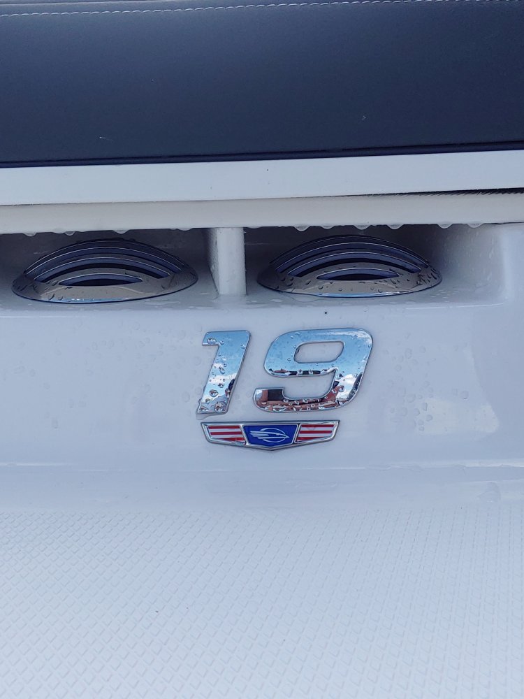 Glass fibers either loose or woven, reinforced with resin and used in the construction of many boats.