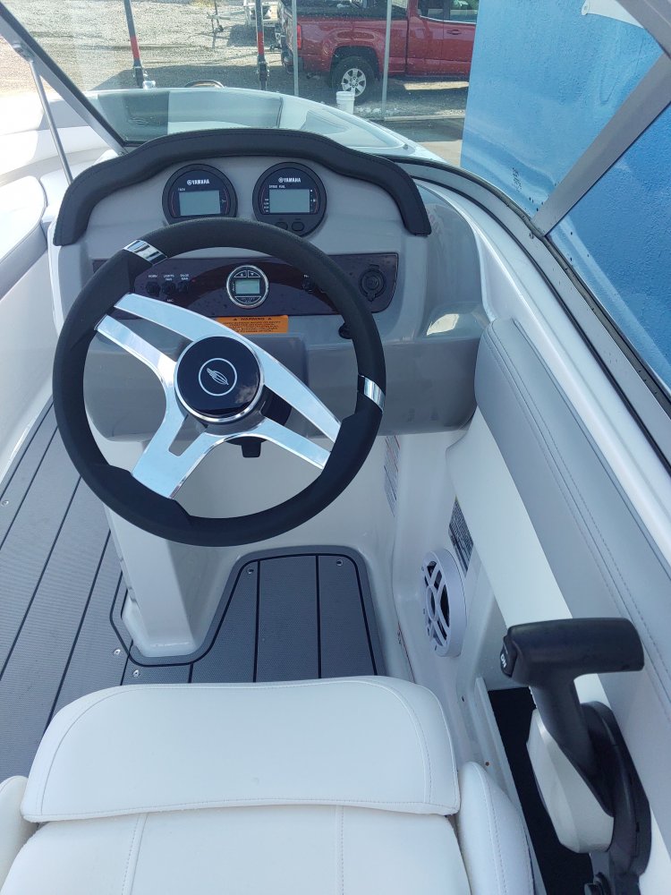 Glass fibers either loose or woven, reinforced with resin and used in the construction of many boats.