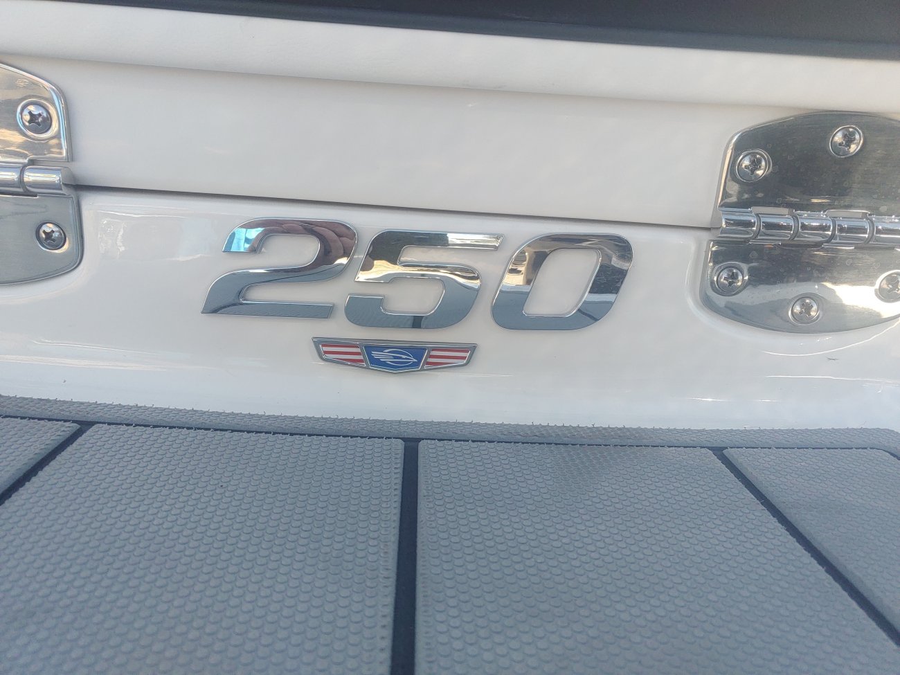 Glass fibers either loose or woven, reinforced with resin and used in the construction of many boats.