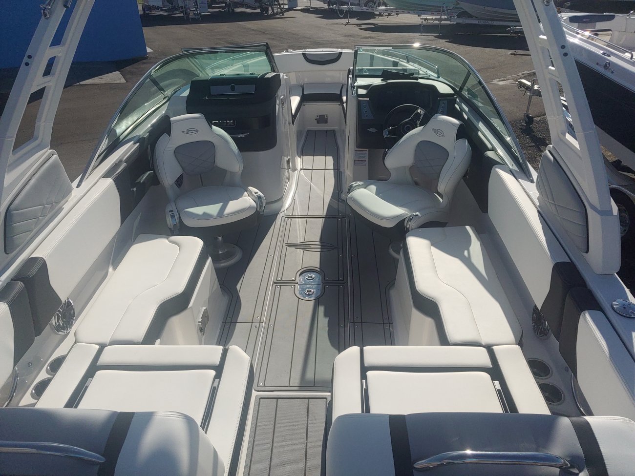 The definition of an outboard motor is a detachable engine mounted on outboard brackets on the stern of your boat.  This configuration will have only one single engine.