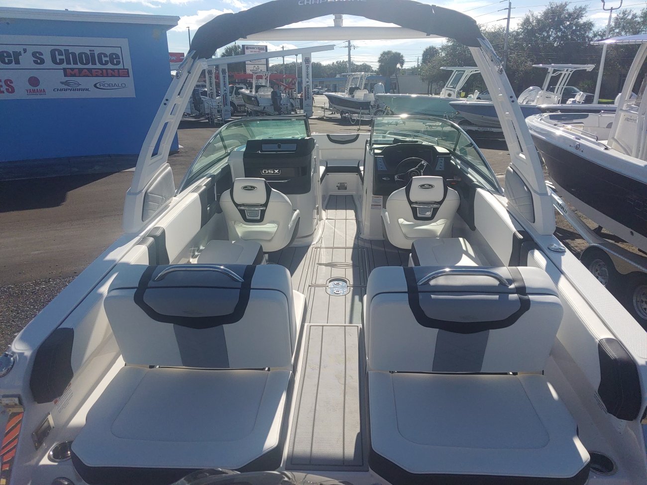 Glass fibers either loose or woven, reinforced with resin and used in the construction of many boats.