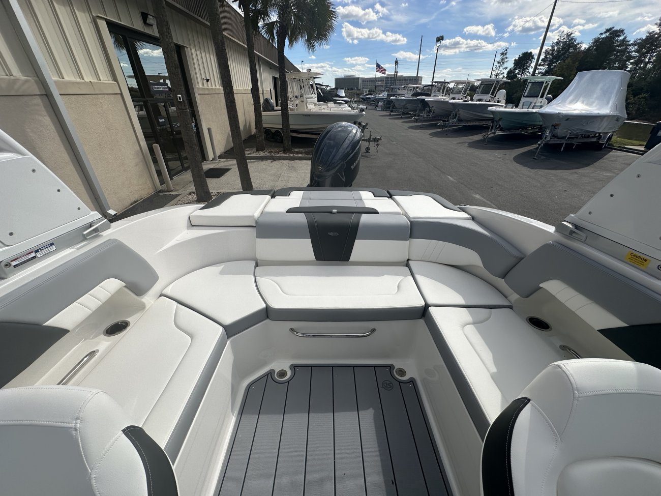A dual console boat is typically one that was designed for salt water fishing and has the console split around a center walk thru to the bow.  The helm is usually starboard while there is passenger seating to port.