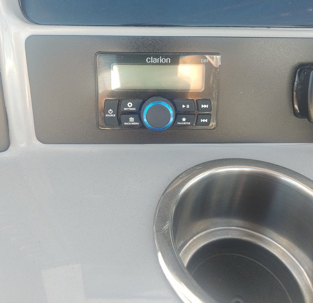 The definition of an outboard motor is a detachable engine mounted on outboard brackets on the stern of your boat.  This configuration will have only one single engine.