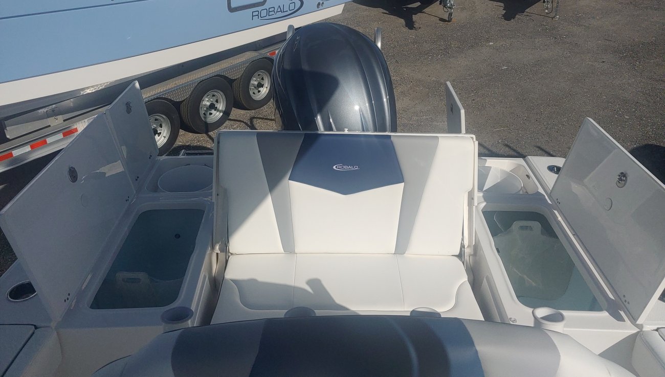 The definition of an outboard motor is a detachable engine mounted on outboard brackets on the stern of your boat.  This configuration will have only one single engine.