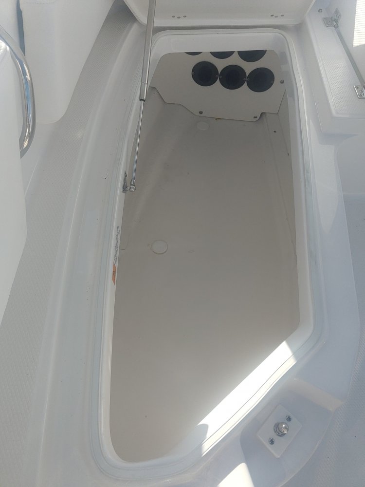Glass fibers either loose or woven, reinforced with resin and used in the construction of many boats.