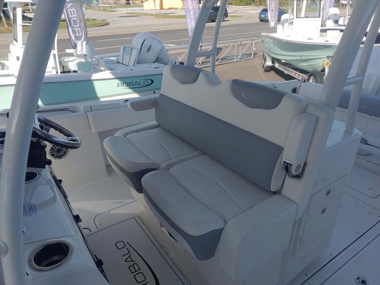 Glass fibers either loose or woven, reinforced with resin and used in the construction of many boats.