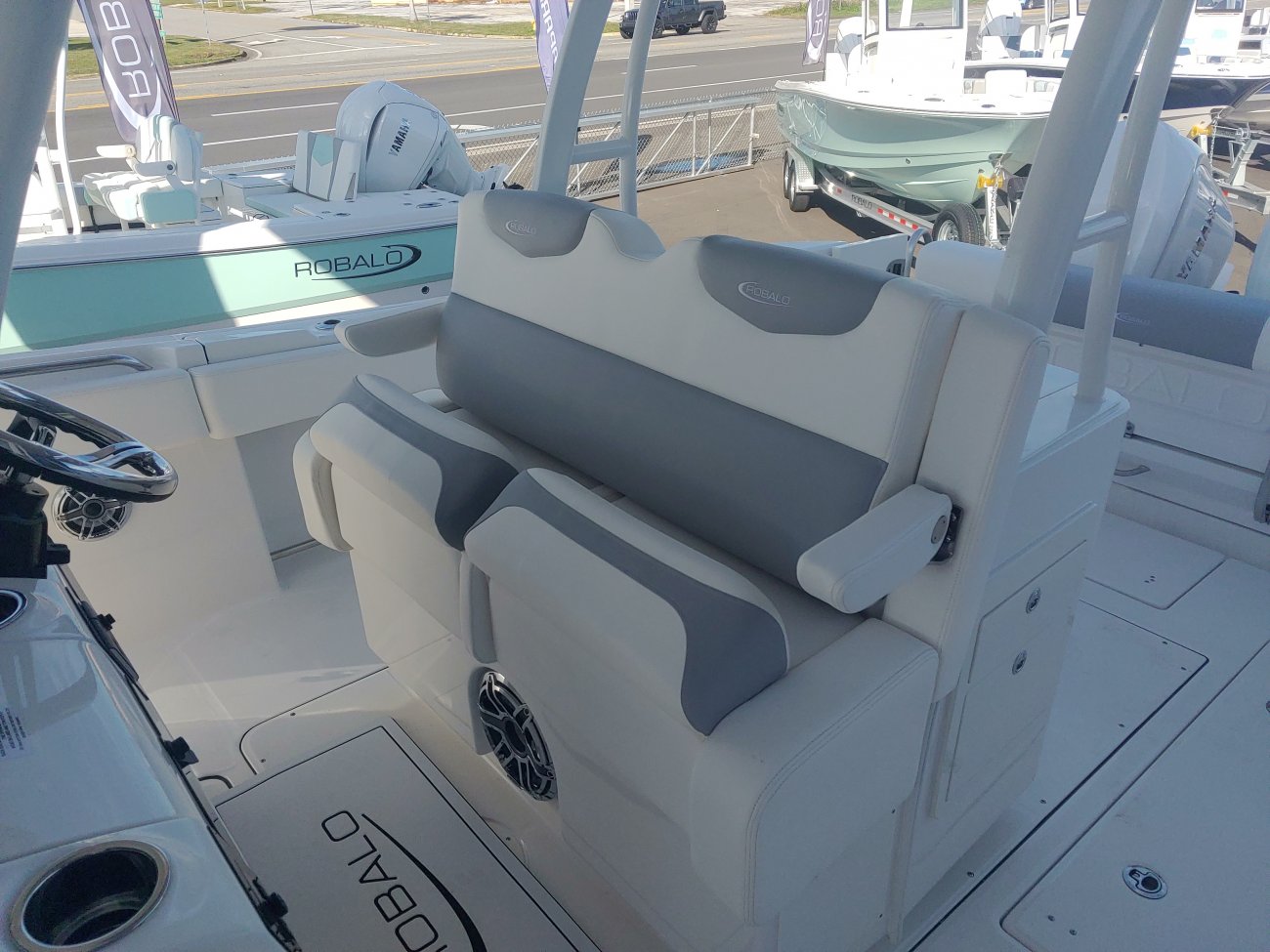 The definition of an outboard motor is a detachable engine mounted on outboard brackets on the stern of your boat.  This configuration will have triple engines.