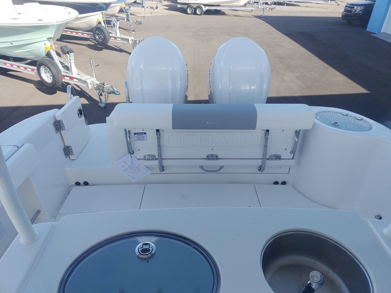 The definition of an outboard motor is a detachable engine mounted on outboard brackets on the stern of your boat.  This configuration will have triple engines.