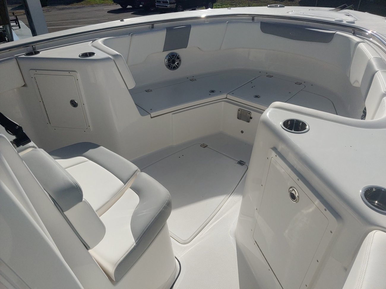 Glass fibers either loose or woven, reinforced with resin and used in the construction of many boats.