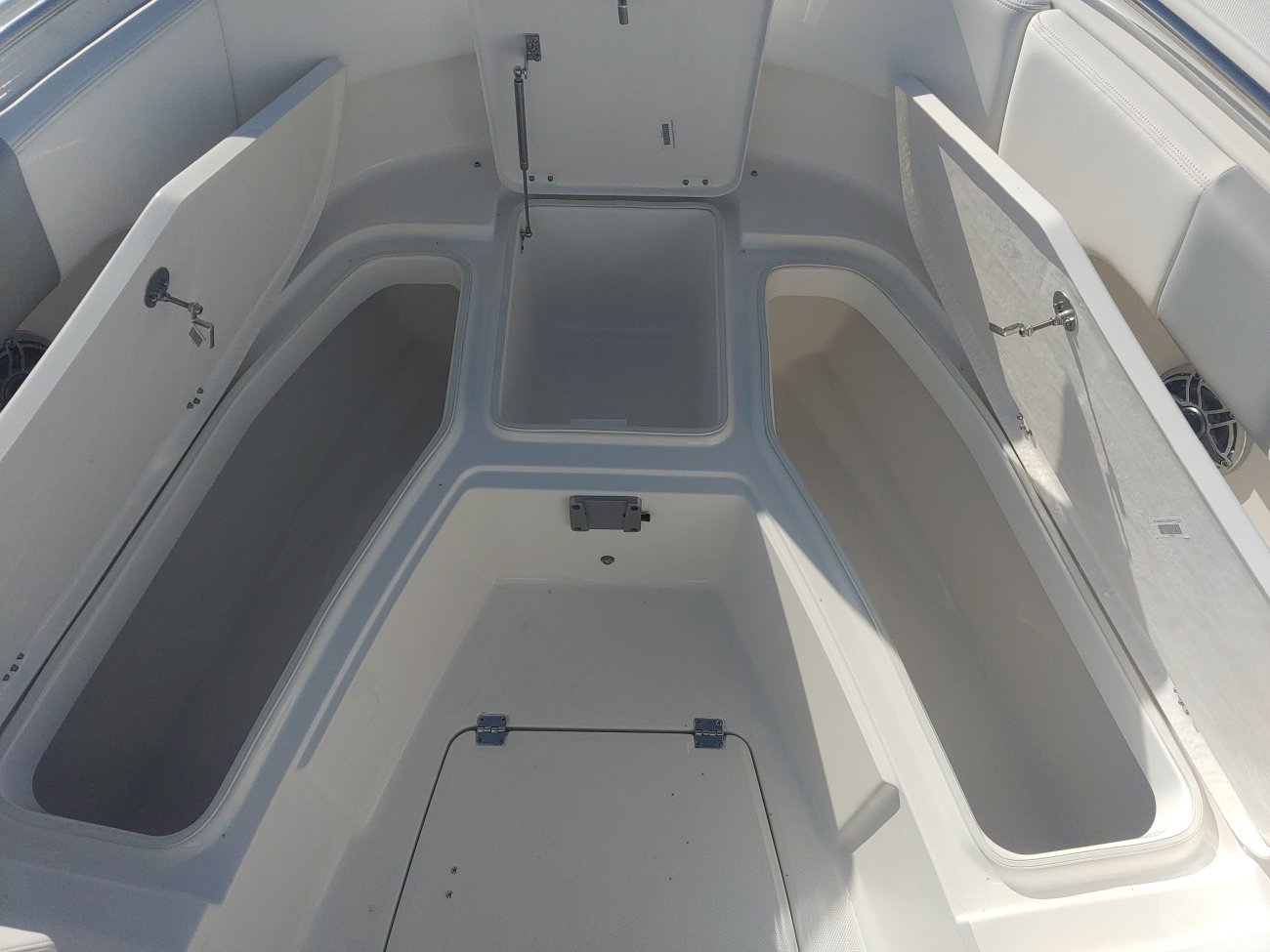 Glass fibers either loose or woven, reinforced with resin and used in the construction of many boats.