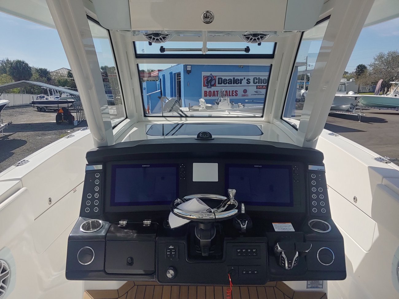 Generally, a Sportfisherman will be a large craft with a fly bridge and outriggers designed to pursue big game fish.  These will be 35 feet up in length and contain all of the amenities to handle heavy blue water.