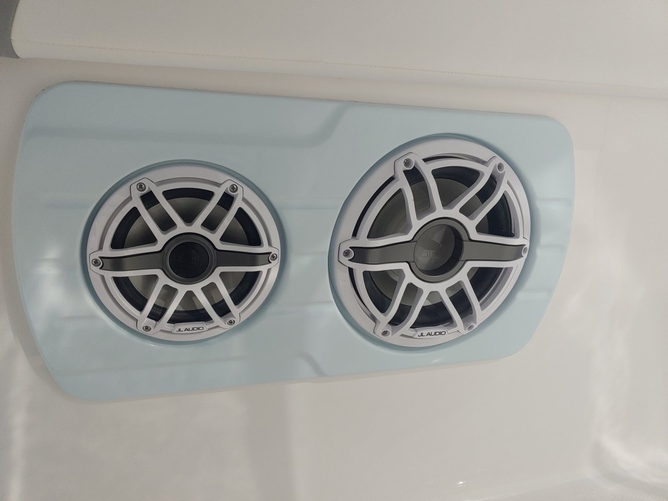 The definition of an outboard motor is a detachable engine mounted on outboard brackets on the stern of your boat.  This configuration will have twin engines.