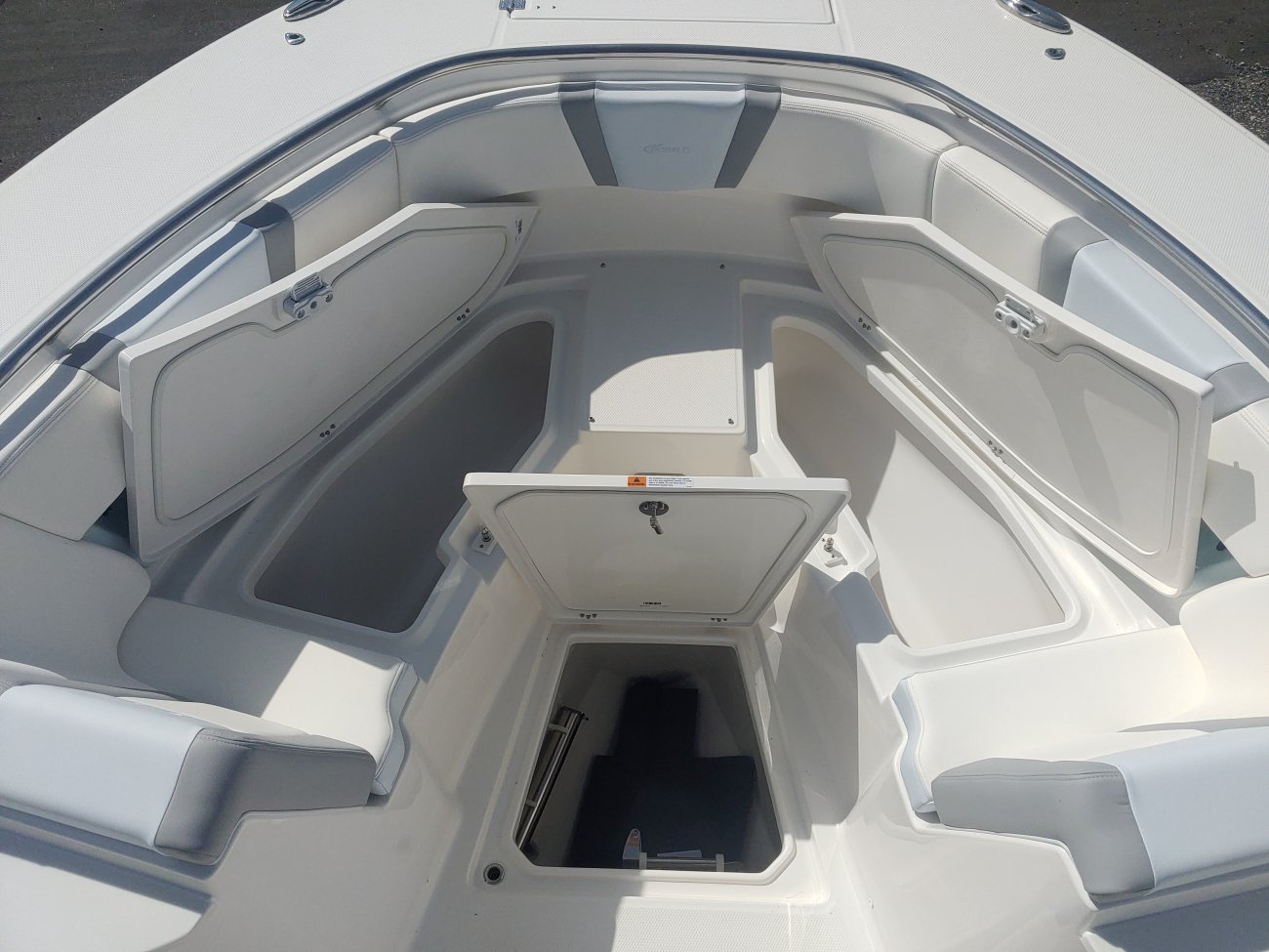 Generally, a Sportfisherman will be a large craft with a fly bridge and outriggers designed to pursue big game fish.  These will be 35 feet up in length and contain all of the amenities to handle heavy blue water.