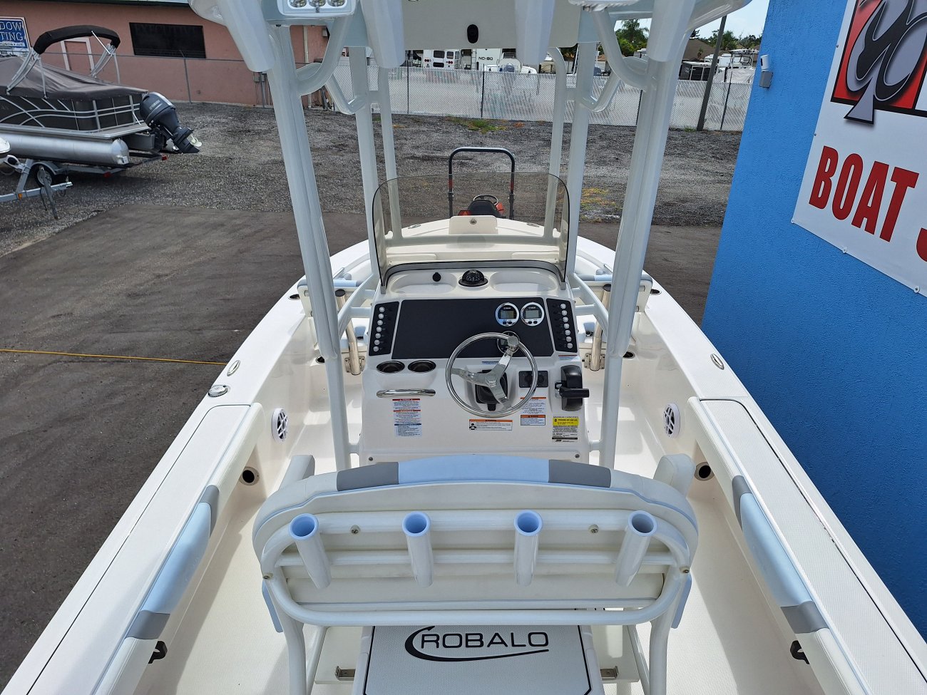 Glass fibers either loose or woven, reinforced with resin and used in the construction of many boats.