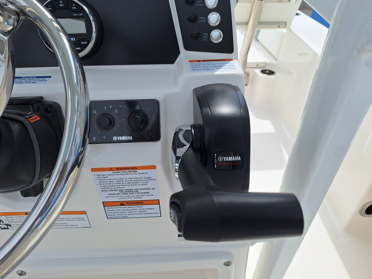 The definition of an outboard motor is a detachable engine mounted on outboard brackets on the stern of your boat.  This configuration will have only one single engine.