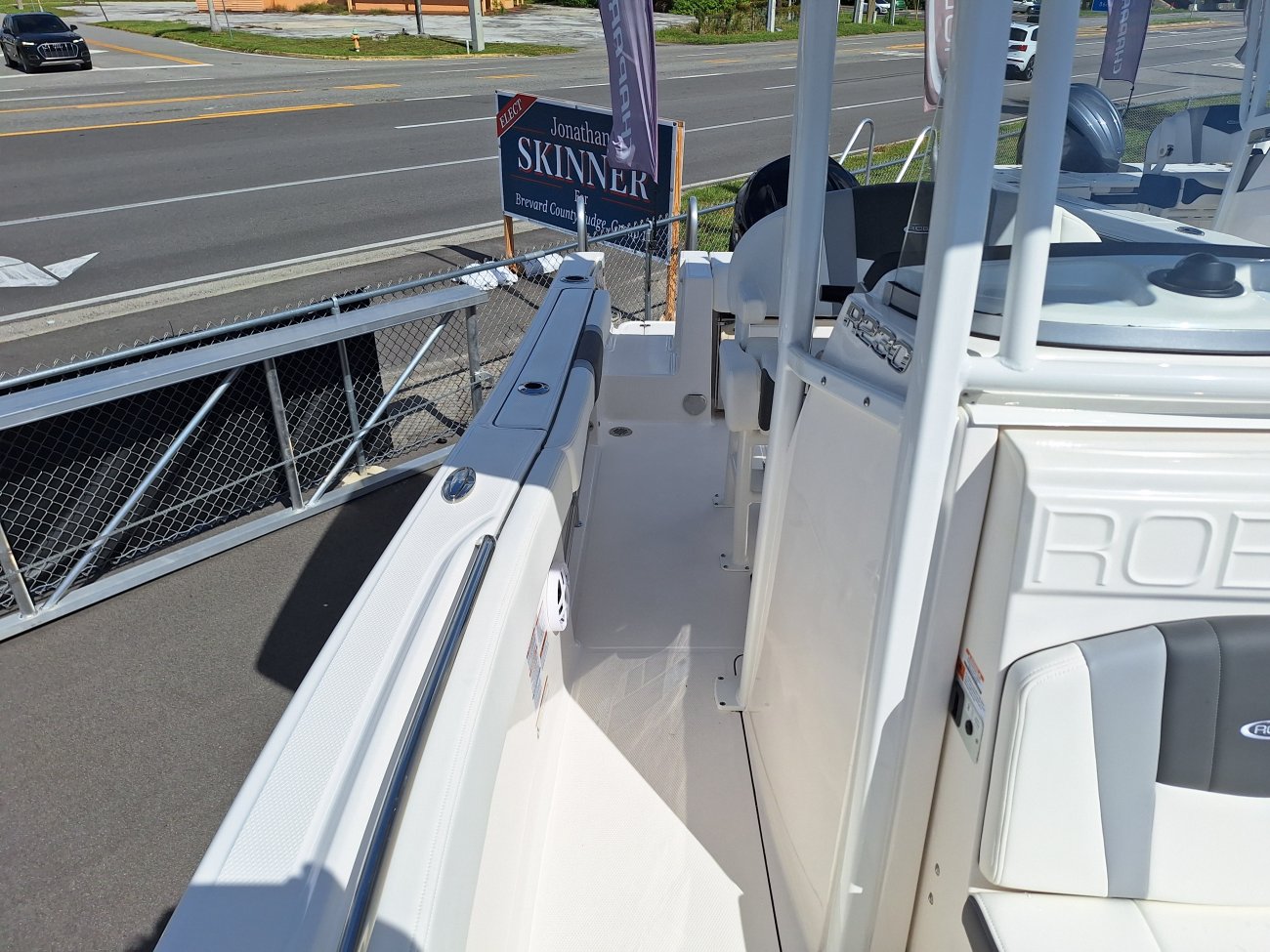 Center console is an open hull boat where the console of the boat is in the center. The boat deck surrounds the console so that a person can walk all around the boat from stern to bow with ease. Most center consoles are powered by outboard motors.
