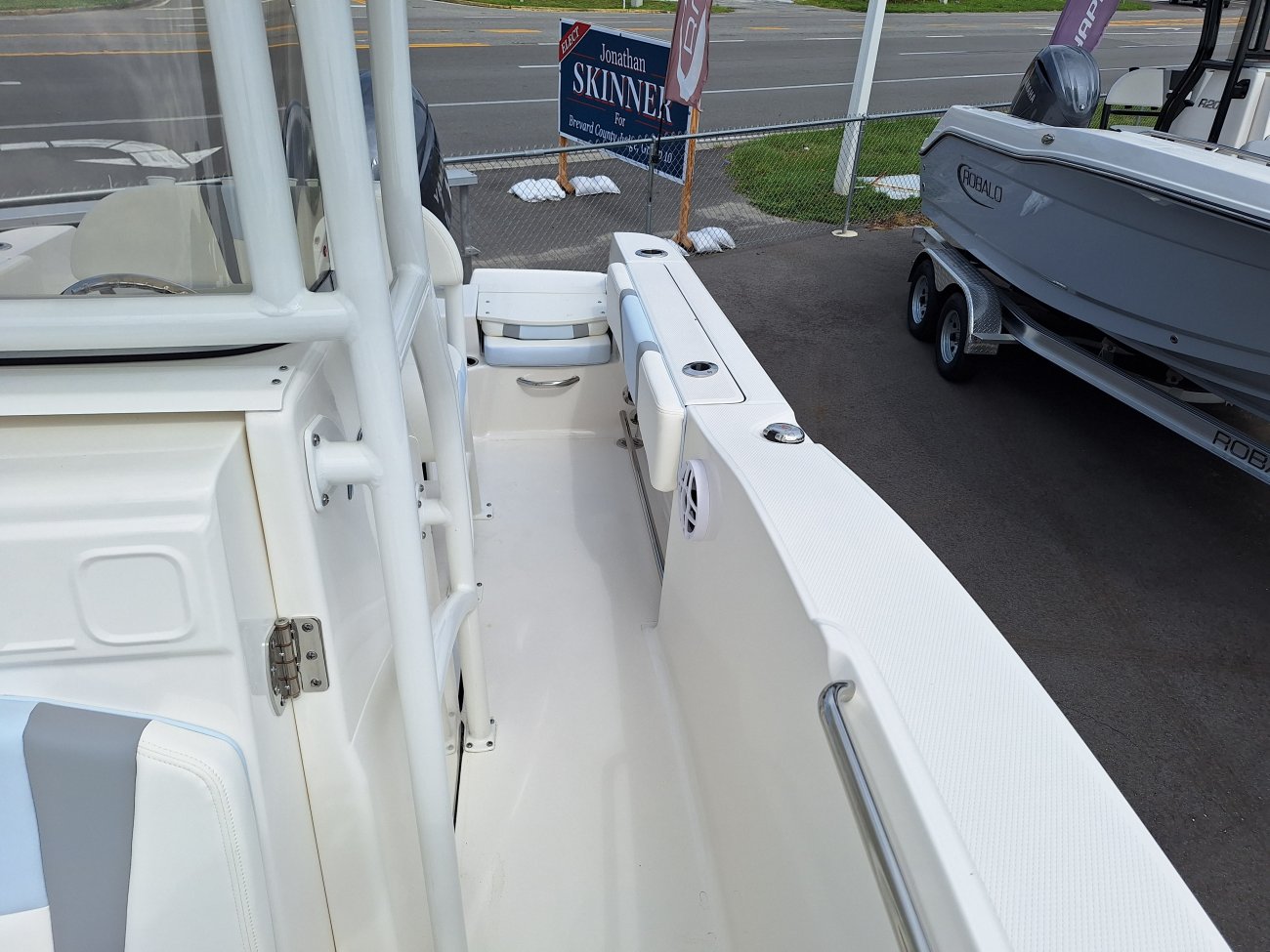 Glass fibers either loose or woven, reinforced with resin and used in the construction of many boats.