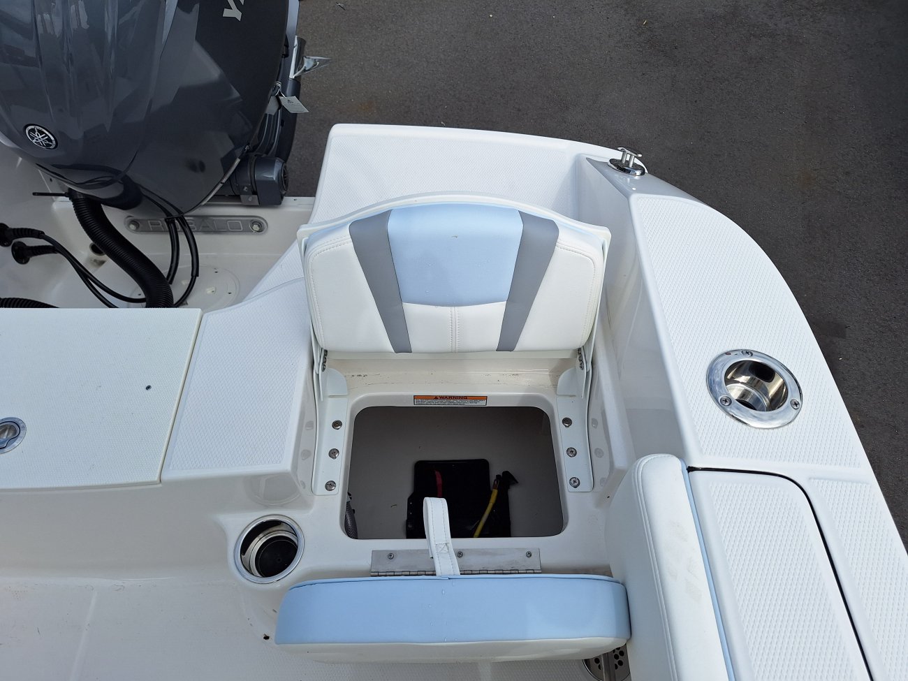 Glass fibers either loose or woven, reinforced with resin and used in the construction of many boats.