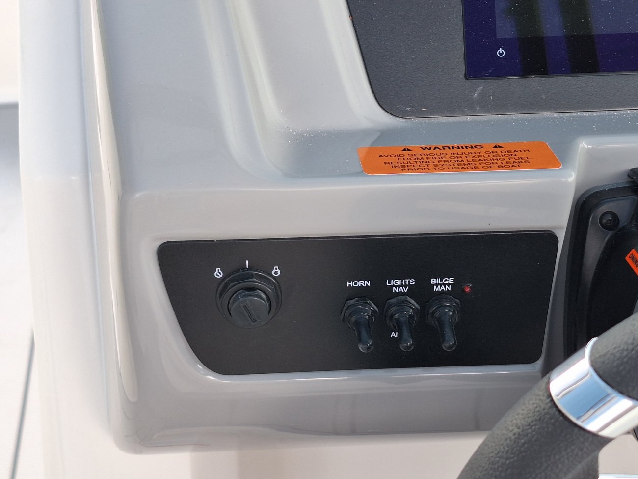 The definition of an outboard motor is a detachable engine mounted on outboard brackets on the stern of your boat.  This configuration will have only one single engine.