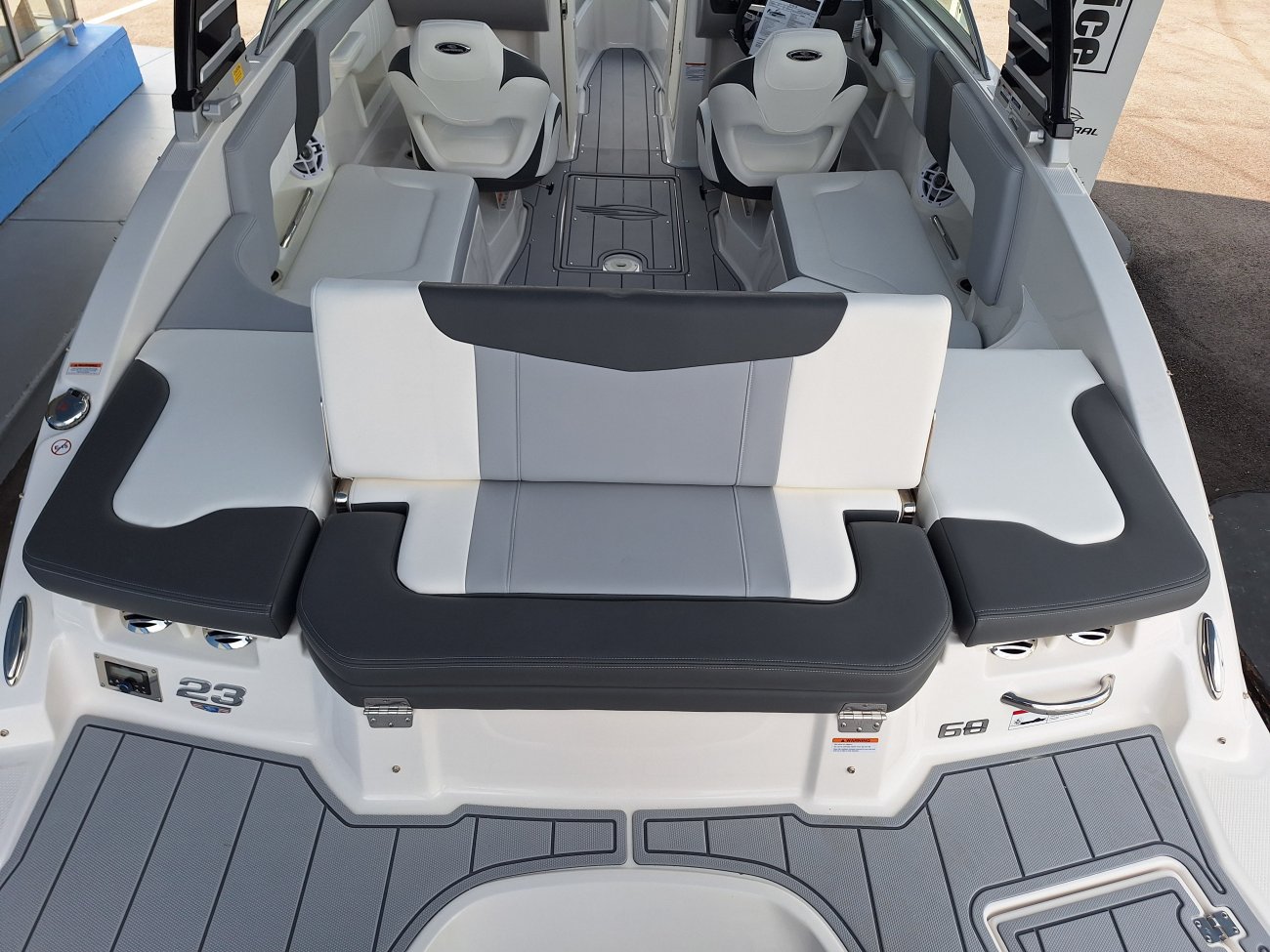 The definition of an outboard motor is a detachable engine mounted on outboard brackets on the stern of your boat.  This configuration will have only one single engine.