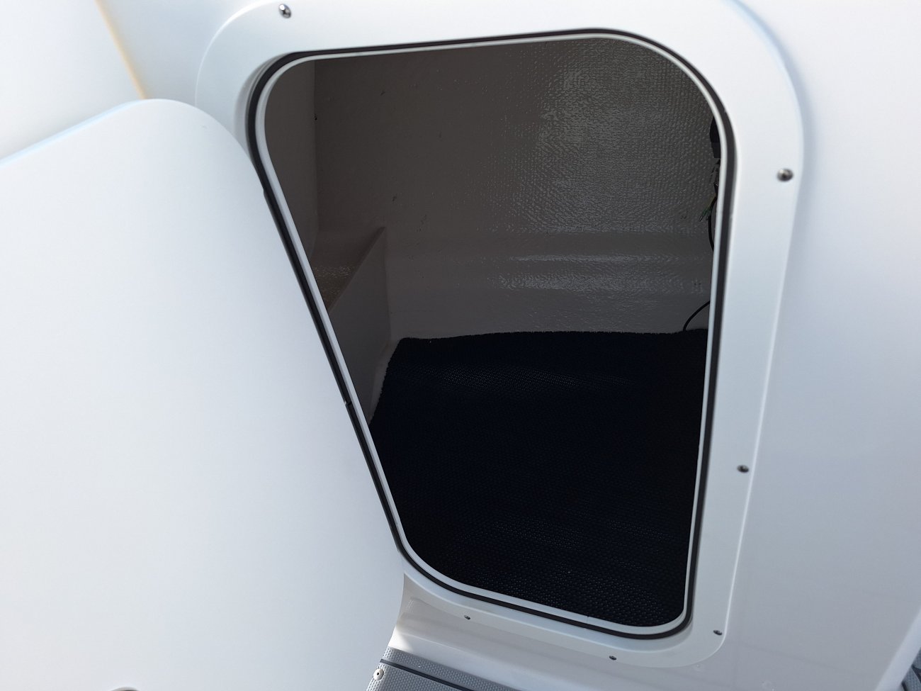 A bow rider is a boat with an open bow area where there are extra seats in front of the windshield.  Bow riders are typically between 17' and 30'long. They are well suited for many recreational water sports such as tubing, water skiing, and swimming.
