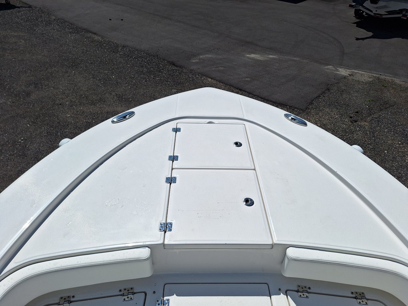 Center console is an open hull boat where the console of the boat is in the center. The boat deck surrounds the console so that a person can walk all around the boat from stern to bow with ease. Most center consoles are powered by outboard motors.