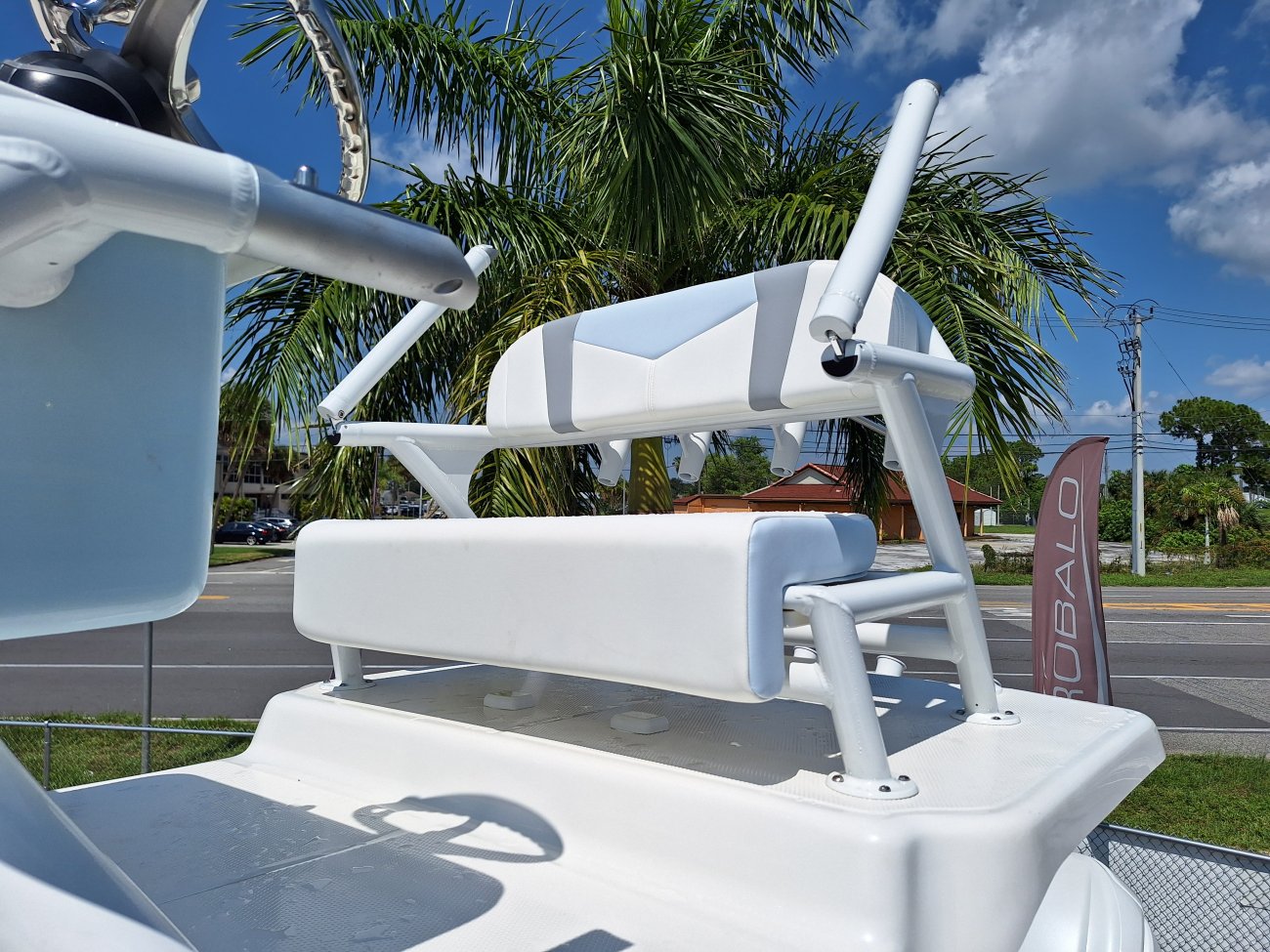 Glass fibers either loose or woven, reinforced with resin and used in the construction of many boats.