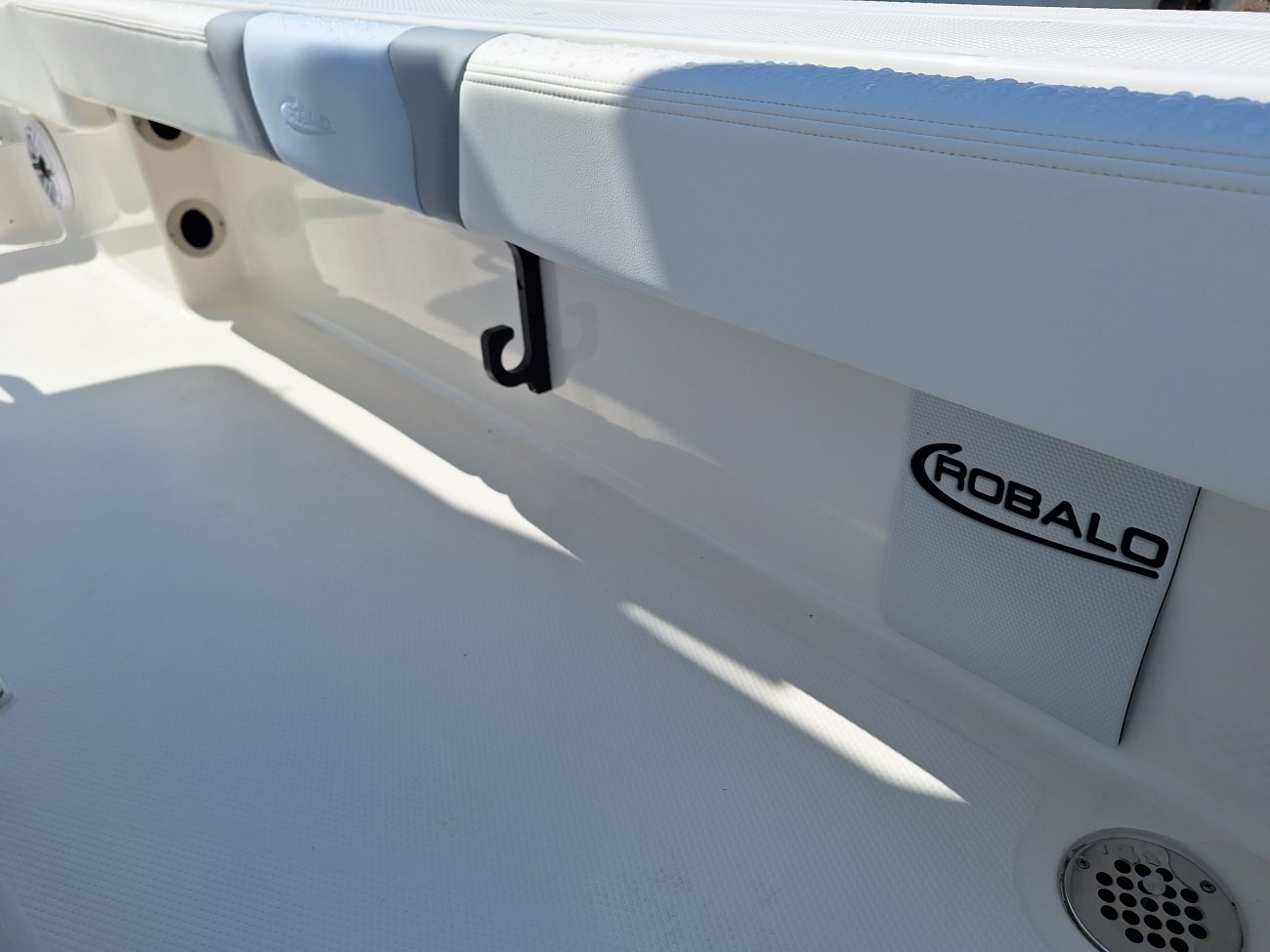 Glass fibers either loose or woven, reinforced with resin and used in the construction of many boats.